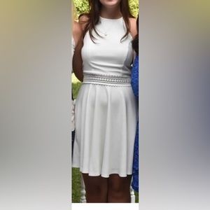 White dress with lace cut out from Francesca’s.